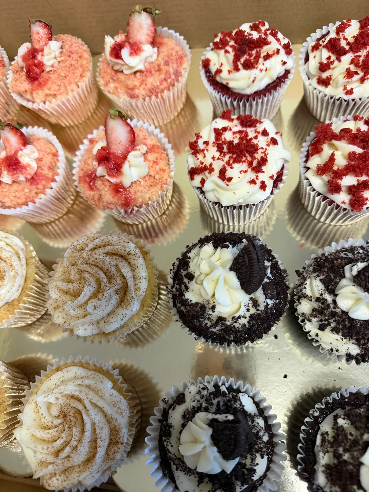 Assorted cupcakes — strawberry crunch, red velvet, Oreo and vanilla